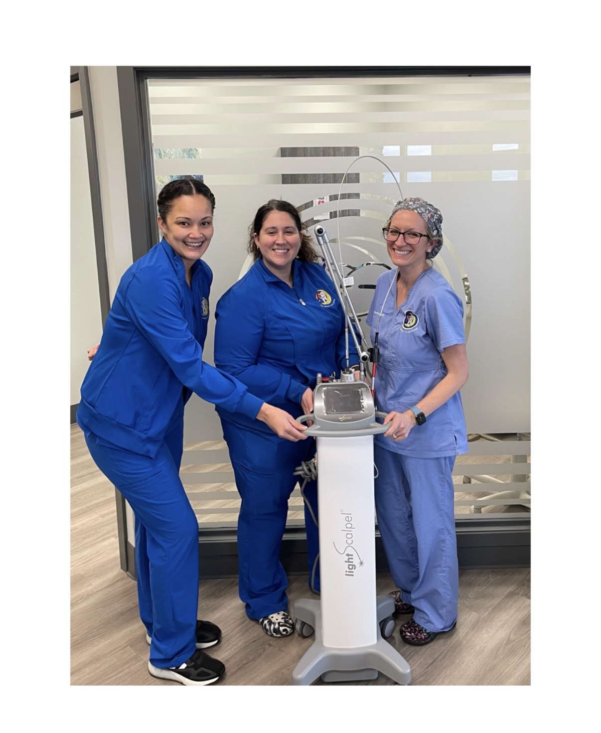 Dr. Morrow and team with LightScalpel laser technology